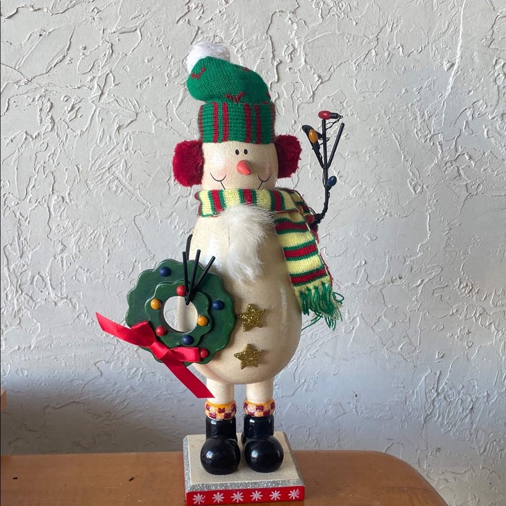 Festive Snowman Holiday nutcracker with Green and Red Accents
